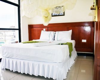 Sheratton Regency Hotel - Mombasa - Schlafzimmer