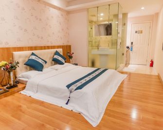 Milan Hotel - Jiangmen - Slaapkamer