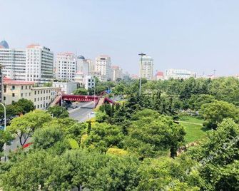 Jingyuan Movie Sporting Hotel (Weihai Weigao Shopping Plaza Weihai Municipal Government Branch) - Weihai - Sala de estar