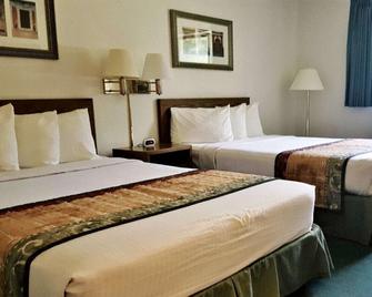 Cassville Four Seasons Inn & Suites - Cassville - Habitación