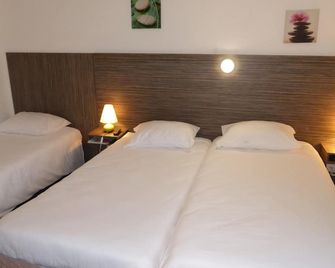 Hôtel Le Cosy Blois Villebarou - בלואה - חדר שינה
