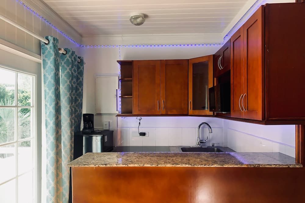 كورال هاربور بيتش هاوس آند فيلاز - ناساو - مطبخ