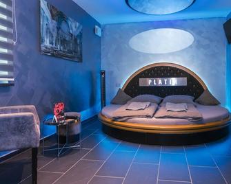 هوتل بلاتين ريجينزبرغ - رغينسبورغ - غرفة نوم