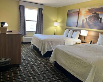 Days Inn by Wyndham Park City Kansas - Wichita - Bedroom