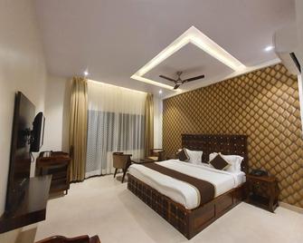 Chauhan Sheraton By Mansingh Group - Pushkar - Phòng ngủ