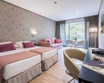 أبارتسويتس جاردينز دي ساباتيني - مدريد - غرفة نوم