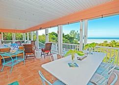 White Sand Beach just steps away! Fabulous Oceanview Porch! - Spanish Wells - Restaurant