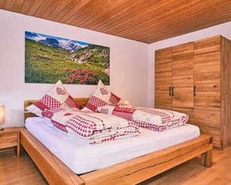 Chiemgauferienwohnungen - Wanderlust und Alpenrose - Unterwössen - Schlafzimmer