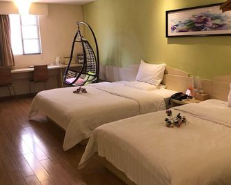 7Days Inn Heyuan Railway Station - Heyuan - Camera da letto