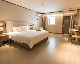 Hanting Hotel Taixing New Energy Meishi - Taizhou - Bedroom