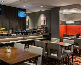 Holiday Inn Winnipeg-South By IHG - וויניפג - מסעדה