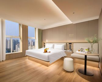 Libai Hotel (Xinxiang Baolong Plaza Pingyuan Museum Branch) - Xinxiang - Schlafzimmer