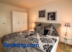 Charming Apartments am See - Бад-Саров - Спальня