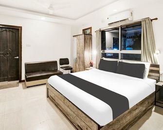 Super Townhouse Hatigaon Near Medicity - גוואטי - חדר שינה
