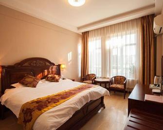 Honggang Hotel - داليان - غرفة نوم