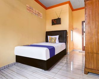 OYO Life 90433 Serasi Kost - Palembang - Camera da letto
