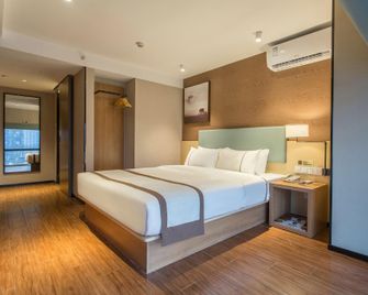 Jtour Inn Nanning East Railway Station - Nanning - Bedroom
