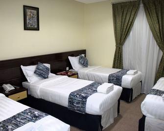 Loulouat Al Anood Hotel Mecca - Mecca - Bedroom