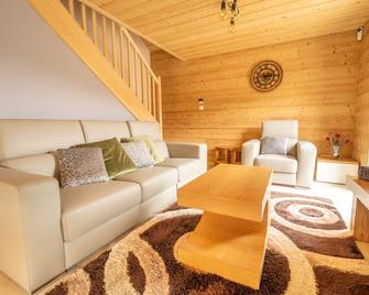 L'orée des bois, SPA et Sauna - Gerbépal - Sala de estar
