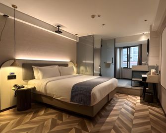 Chocolate Hotel (Changsha Wuyi Square Yuanjialing - Changsha - Bedroom