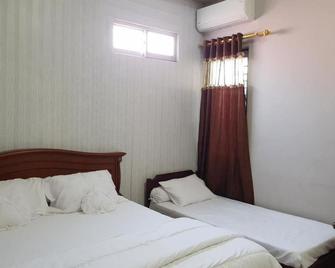 Homestay Lotus Bangka Mitra RedDoorz - Пангкалпінанг - Спальня
