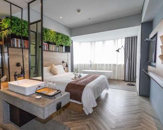 Guofa Hualian Hotel - Beihai - Quarto
