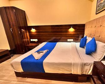Aura Inn - Bombay - Habitación