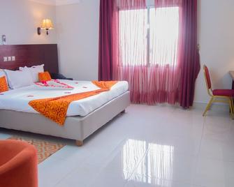 Hôtel La Rose Blanche Abidjan - Abidjan - Bedroom