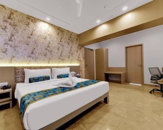 Iris Beacon Hotel - Rajkot - Ložnice