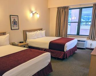 Travelodge Inn & Suites by Wyndham Deadwood - Deadwood - Bedroom