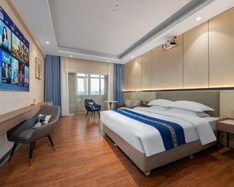 Longyue Business Hotel (Qingyuan gymnasium people's Hospital store) - Qingyuan - Bedroom