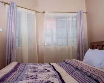 The Gladstone House - Nyeri - Slaapkamer