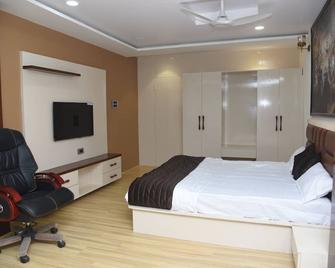Hotel MM Prestige - Jagdalpur - Camera da letto