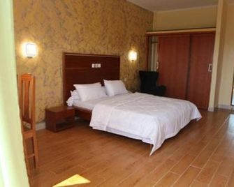 Cityzen Hotel - Douala - Camera da letto