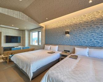 هوتل آند سبا جيفت تاكاياما - تاكاياما - غرفة نوم