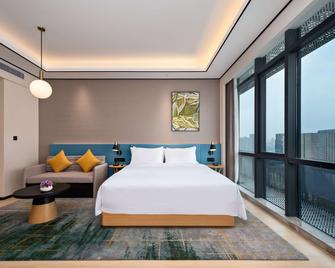 Hilton Garden Inn Nanchang Honggutan - Nanchang - Schlafzimmer