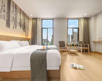 Vyluk Hotel Chongqing Guanyinqiao Beicheng Tianjie Store - Chongqing - Schlafzimmer