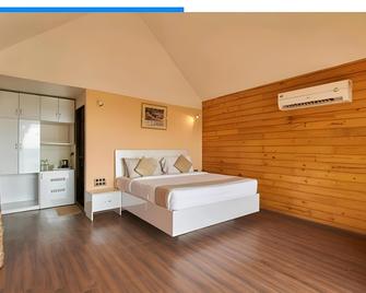 Rumourss Sky Villa And Resort - 羅納瓦拉 - 臥室