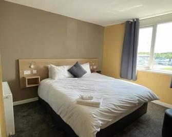 Tinapa Suites - Mánchester - Habitación