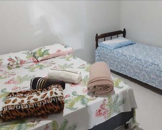 Pousada flores de ipê - Capitólio - Schlafzimmer