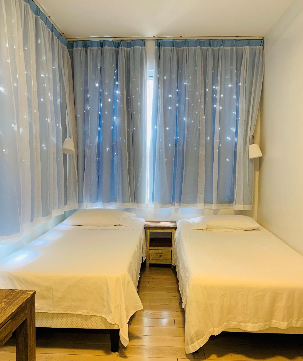 كامواي لودج آند ترافيل - كوينز - غرفة نوم