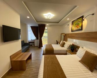 Dalat Central Hostel - Dalat - Yatak Odası