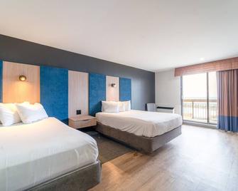 Ramada by Wyndham Jordan/Beacon Harbourside Resort - Lincoln - Bedroom