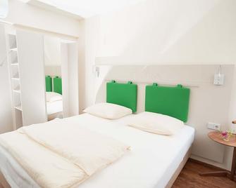 Stadthotel Engel - Ettlingen - Bedroom