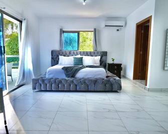 Villa Pravda Guerra 4br 6bds 12pax - Santo Domingo Oeste - Habitación