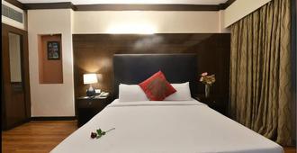 Hotel Pal Heights - Bhubaneshwar - Schlafzimmer