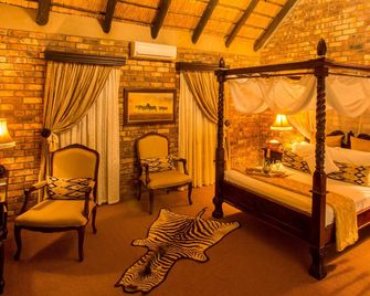 Elandela Private Game Reserve & Luxury Lodge - הודספרוט - חדר שינה