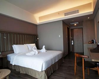 Gammara Hotel Makassar - Makassar - Bedroom