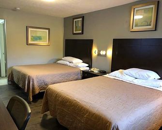 Deerfield Inn & Suites Steele Near Blytheville I-55 - Steele - Habitación