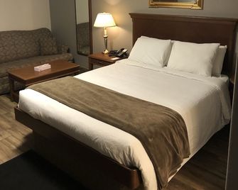 Talbot Trail Inn & Suites - Leamington - Schlafzimmer
